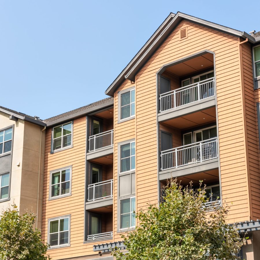 Exterior view of modern apartment building offering luxury rental units in Silicon Valley; Redwood City, San Francisco bay area, California